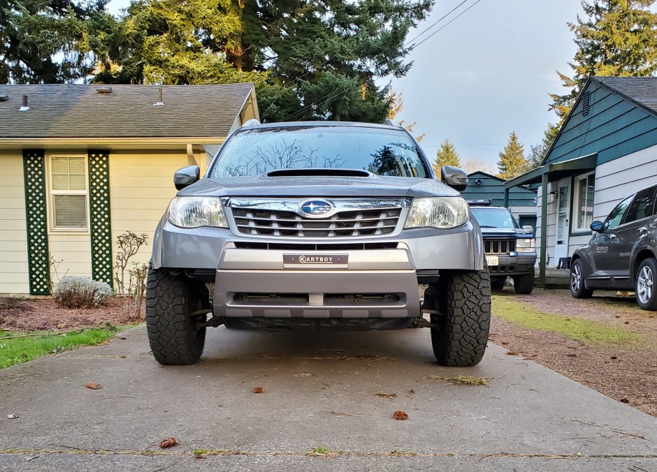 Rodney  Reed 's 2011 Forester XT Turing
